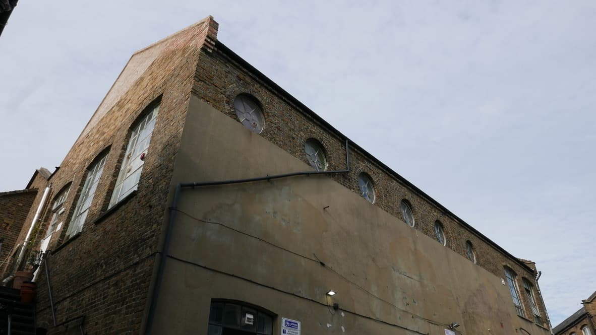 Exterior view of Good Mews Studio building showcasing the industrial architecture and creative workspace location in North London